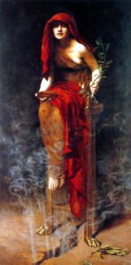 Painting in Pre-Raphaelite style of the Delphic Oracle. She sits inhaling steam from a crack beneath her feet and wears red and orange robes.
