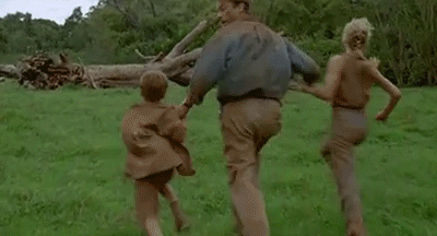Gif of Jurassic Park characters Alan Grant, Lex Murphy and Tim Murphy running away from a hoard of ducklings.