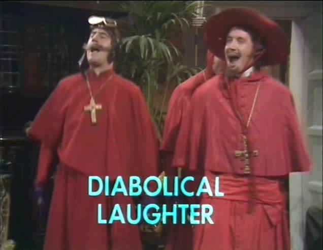 Terry Jones and Michael Palin dressed as the Spanish Inquisition from the famous Monty Python sketch (what do you mean you've not seen it?)